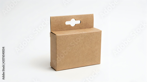 Brown cardboard box with handle on white surface