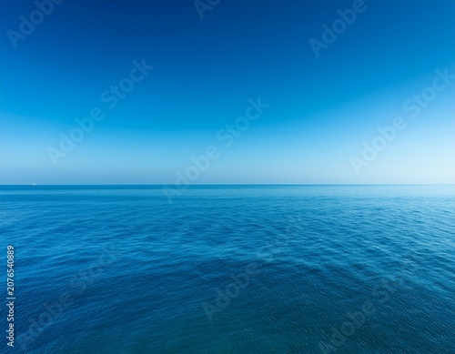 clear blue sky and sea with a horizon line representing peace and tranquility blue sky sea horizon clear