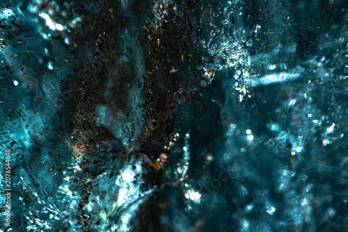 Abstract macro shot of frozen blue glacial ice in Iceland