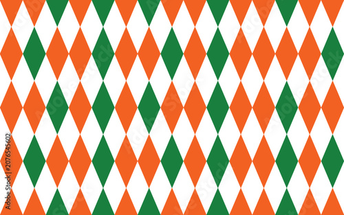 Картината върху платно Vibrant green orange and white harlequin diamond pattern celebrating Irish heritage with bright flat lighting for festive backdrop
