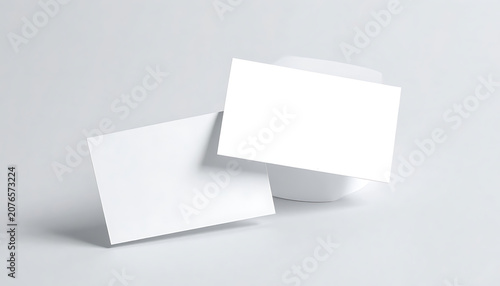 Two floating blank business cards for branding identity presentation and corporate mockup design