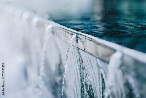 Close Up of Flowing Water in Modern Urban Fountain