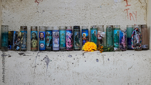 Votive candles at the El Tiradito shrine in the barrio viejo or old neighborhood of Tucson, Arizona, are a testament to people who have been lost or forgotten.