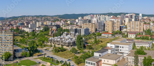Fotografie Aerial Panoramic View of Pristina Cityscape with National Library of Kosovo and