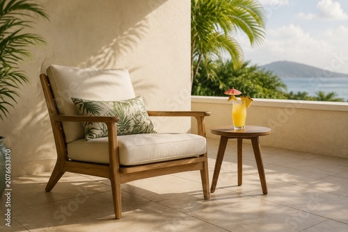 A lounge chair and side table with a drink on a tiled lanai in soft afternoon light.