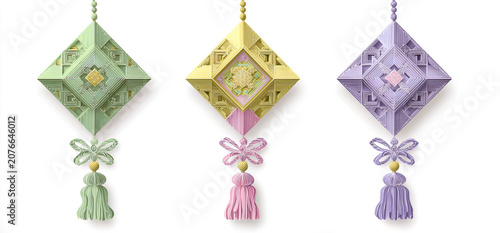 Three decorative hanging ornaments with tassels