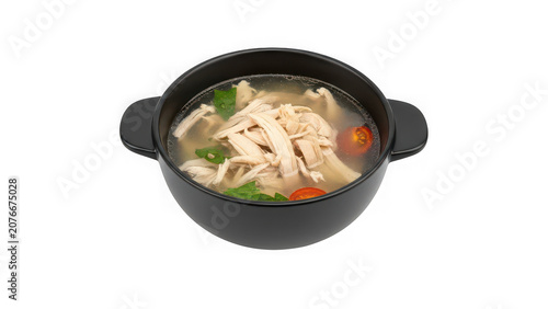 Bowl of homemade chicken soup with shredded chicken, fresh herbs, and cherry tomatoes isolated on transparent background