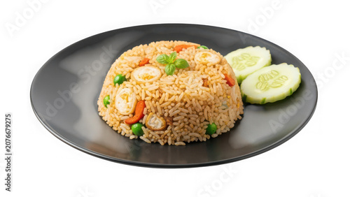 A plate of fried rice with vegetables and cucumber slices isolated on transparent background