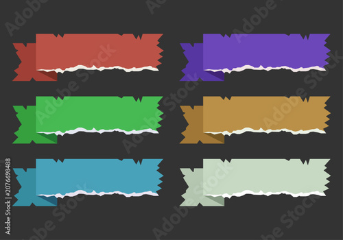Fotografie Conjunto de cintas adhesivas rasgadas de colores sobre fondo oscuro