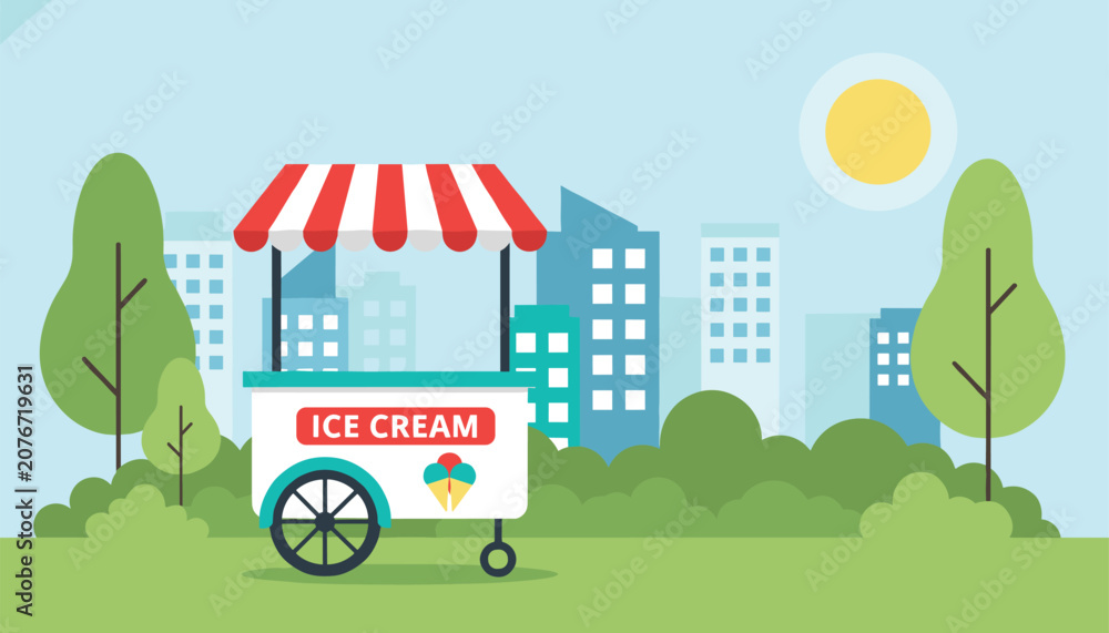 Fototapeta premium Cute ice cream cart parked in a lush green city park under a bright sunny sky with skyscrapers in the background.