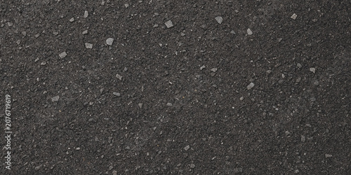 Photos Asphalt surface with small gravel fragments dark gray texture and grainy composi