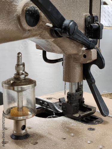 Sewing machine. Sewing mechanism. Cutting and sewing industry