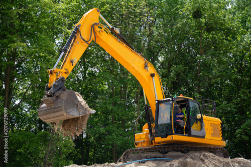 Construction Site with  Crawler Excavator Performing Earthworks