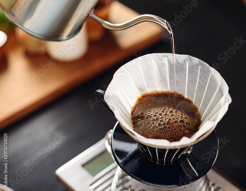 fresh coffee preparation with pour over drip and paper filter