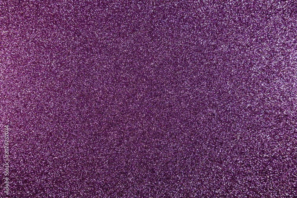 Fototapeta premium Purple glitter textured surface shimmering reflective sparkling abstract background