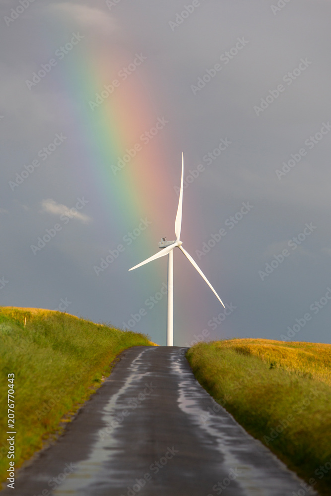Naklejka premium rainbow and wind turbine in the north of france