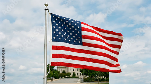 American flag waving in front of government building