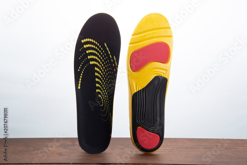 Fotografie Orthopedic shoe insoles. Shoe accessories.