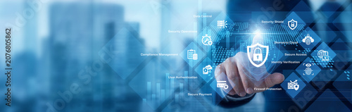 Photos Security analyst analyzing digital data pointing hand at Cybersecurity protocol graph chart growth metrics across a highly secure global network