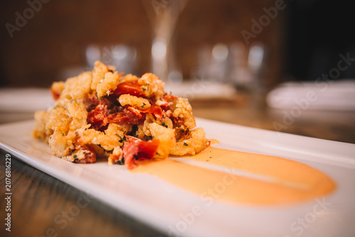 Konstfotografi plate of food placed on a table