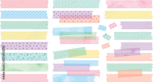 Assorted pastel washi tapes in various patterns and textures arranged on a clean white background