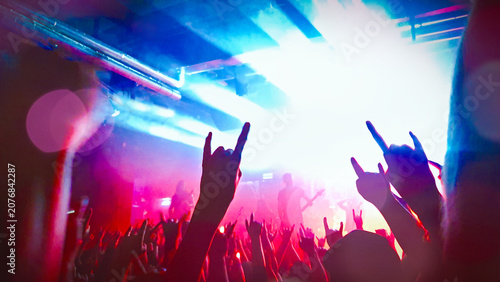 Konstfotografi Crowd of people with heavy metal devil horn sign mano cornuta hands up at live r