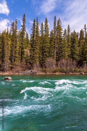 Turquoise Currents Flowing Through A Kananaskis Park