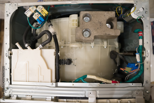 Valokuva Full overhead view of completely disassembled washing machine interior showing d