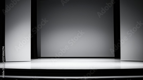 Empty Stage with Spotlights: A dramatic empty stage awaits its performers, illuminated by focused spotlights, creating an atmosphere of anticipation and potential.
