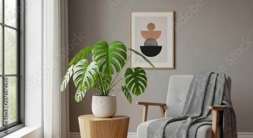 Cozy and serene interior corner featuring a large Monstera plant on a wooden stool, a comfortable armchair, and modern abstract wall art, ideal for home decor mockups.