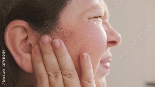 unhappy Mature woman holding painful ear, agony earache grimace, suffering health problems, sharp pain issue, ringing auditory hallucinations, hearing perception, mental health, unusual sounds