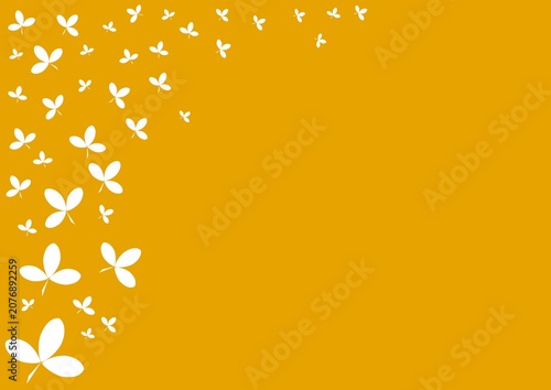 White clover leaves silhouettes flying on golden yellow background, autumn fall nature botanical illustration with copy space.