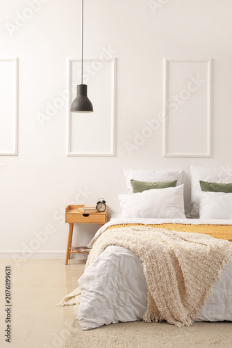 Interior of light bedroom w...
