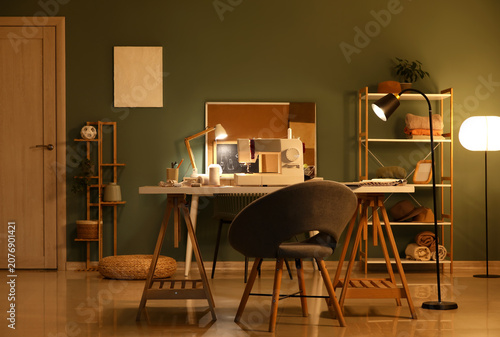 Interior of dark atelier wi...