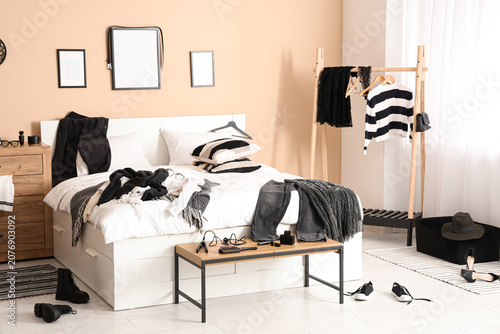 Interior of messy bedroom w...