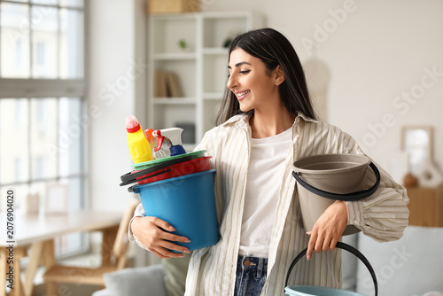 Young woman with plastic bu...
