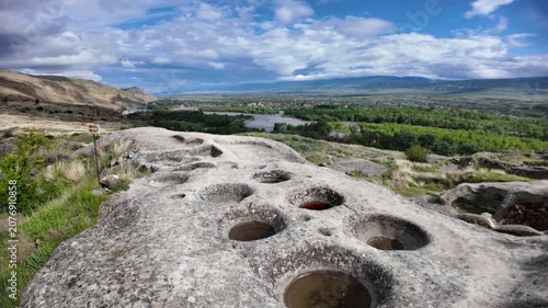 Uplistsikhe. wine cellar of old rock-cut town near Gori. Highlights the archaeological remains of dwellings and wine cellar carved into the natural stone in Georgia near Gori city