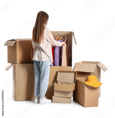 Young woman and wardrobe bo...