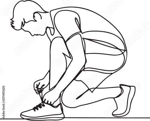 Obraz na plátně young athlete person tightening the rope of sneakers