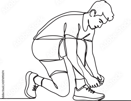 Obraz na plátně young athlete person tightening the rope of sneakers