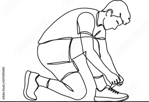 Obraz na plátně young athlete person tightening the rope of sneakers