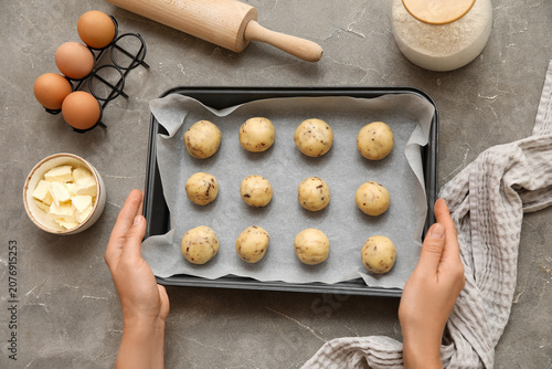 Female hands holding baking...