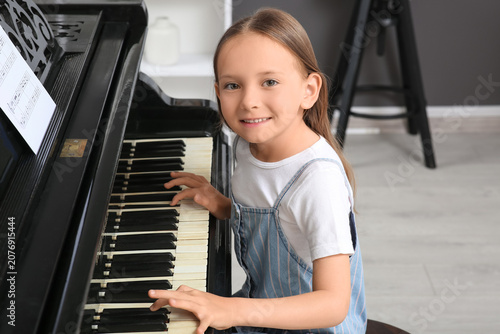 Cute little happy girl with...