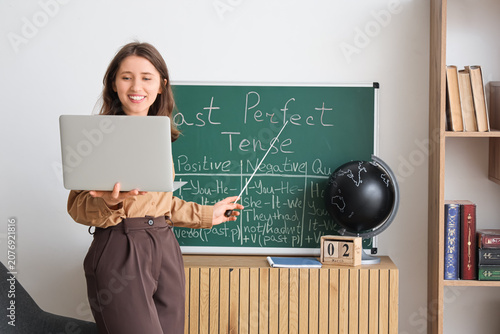 Female teacher conducting English lesson online