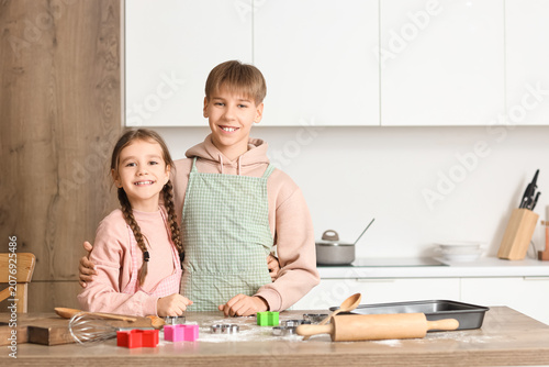 Teenage boy with his sister...