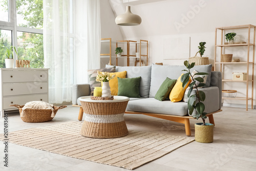 Sofa, wicker basket and tab...