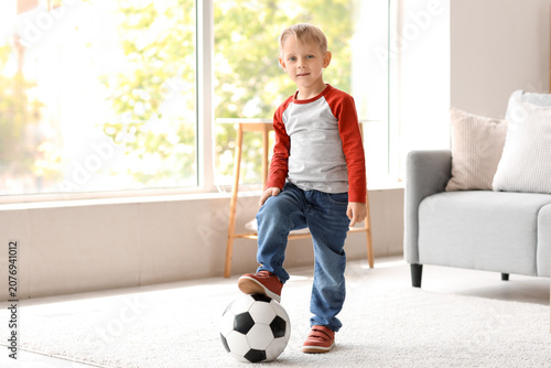 Cute little boy playing wit...