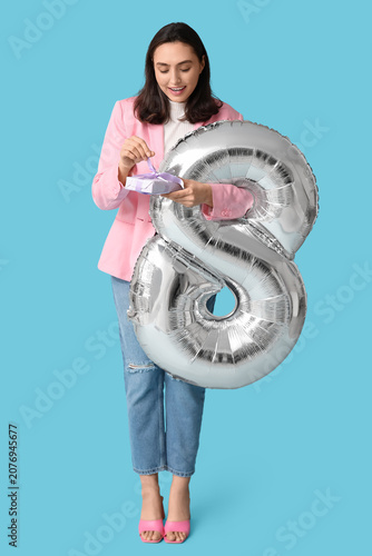 Beautiful young woman with ...
