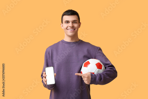 Young man with soccer ball ...