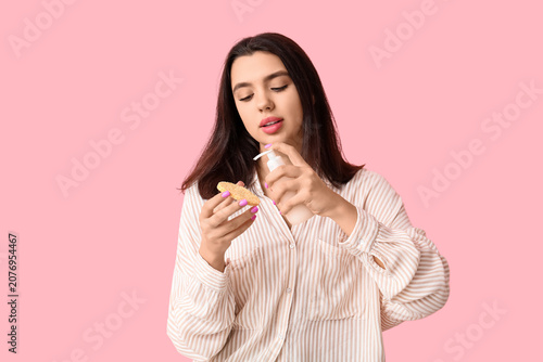 Young woman with makeup spo...